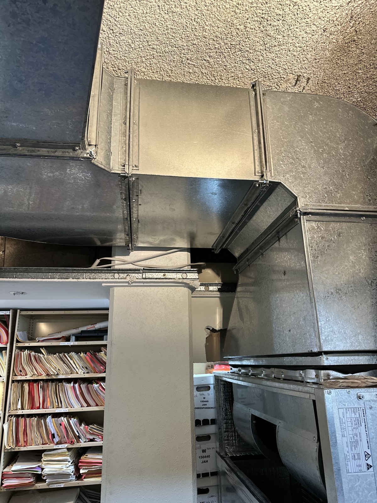 Sheet metal air-conditioning ductwork with bends and connecting sections